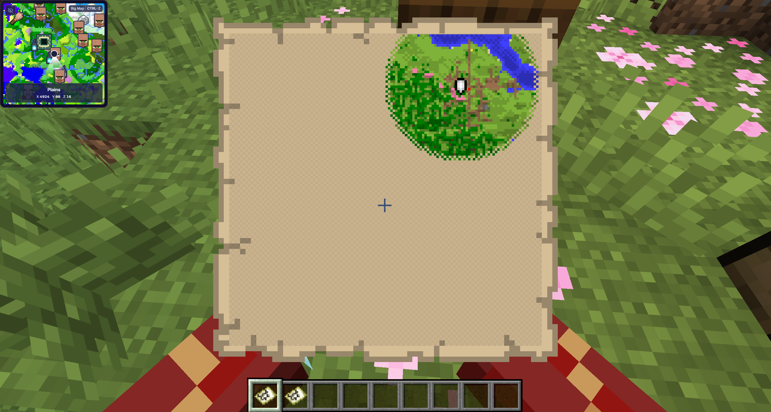 A Minecraft player holding a map expanded to cover a wider area